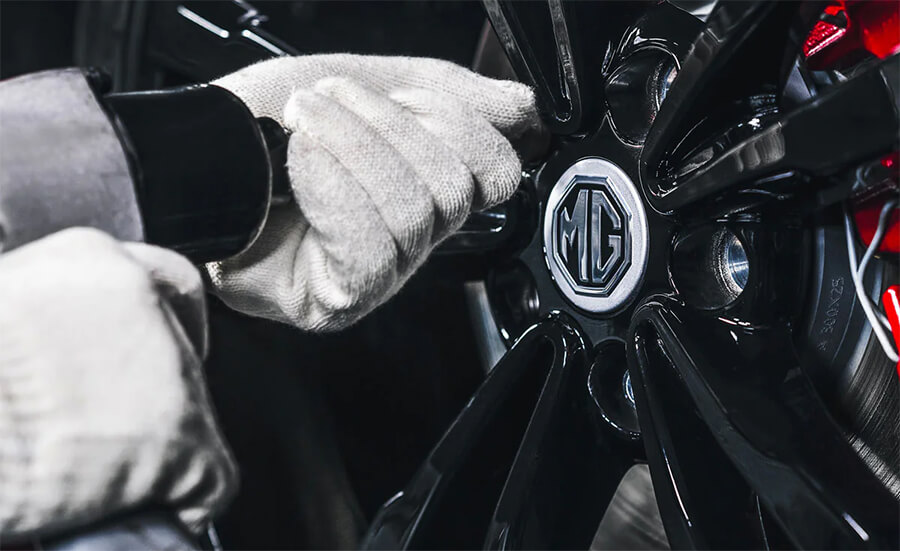 Removing wheel nuts on an MG vehicle