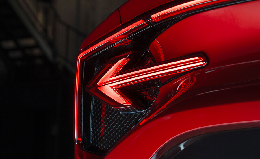 Rear LED arrow-shaped taillights