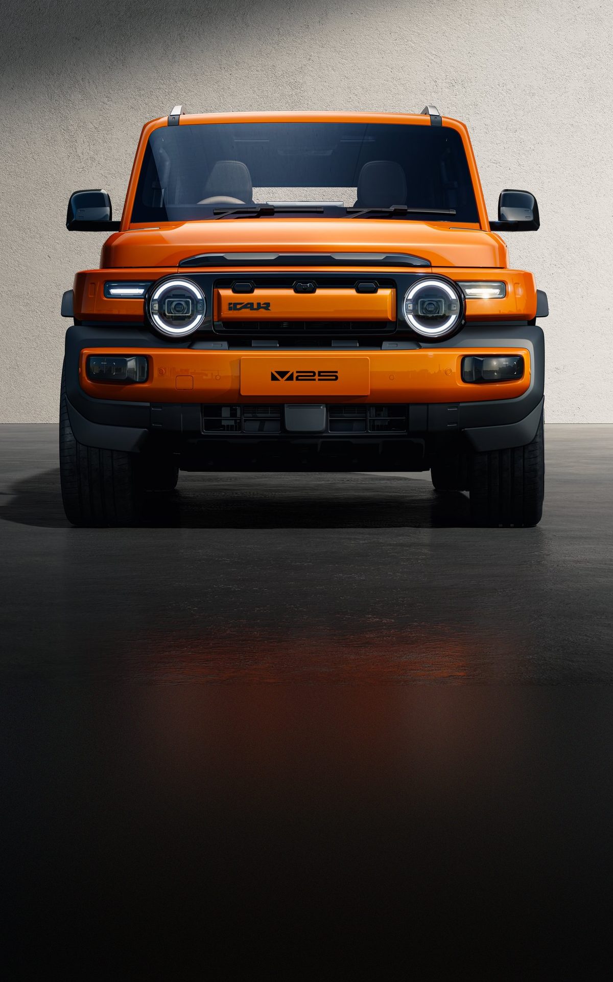 iCAUR V25 in orange, head-on in a studio