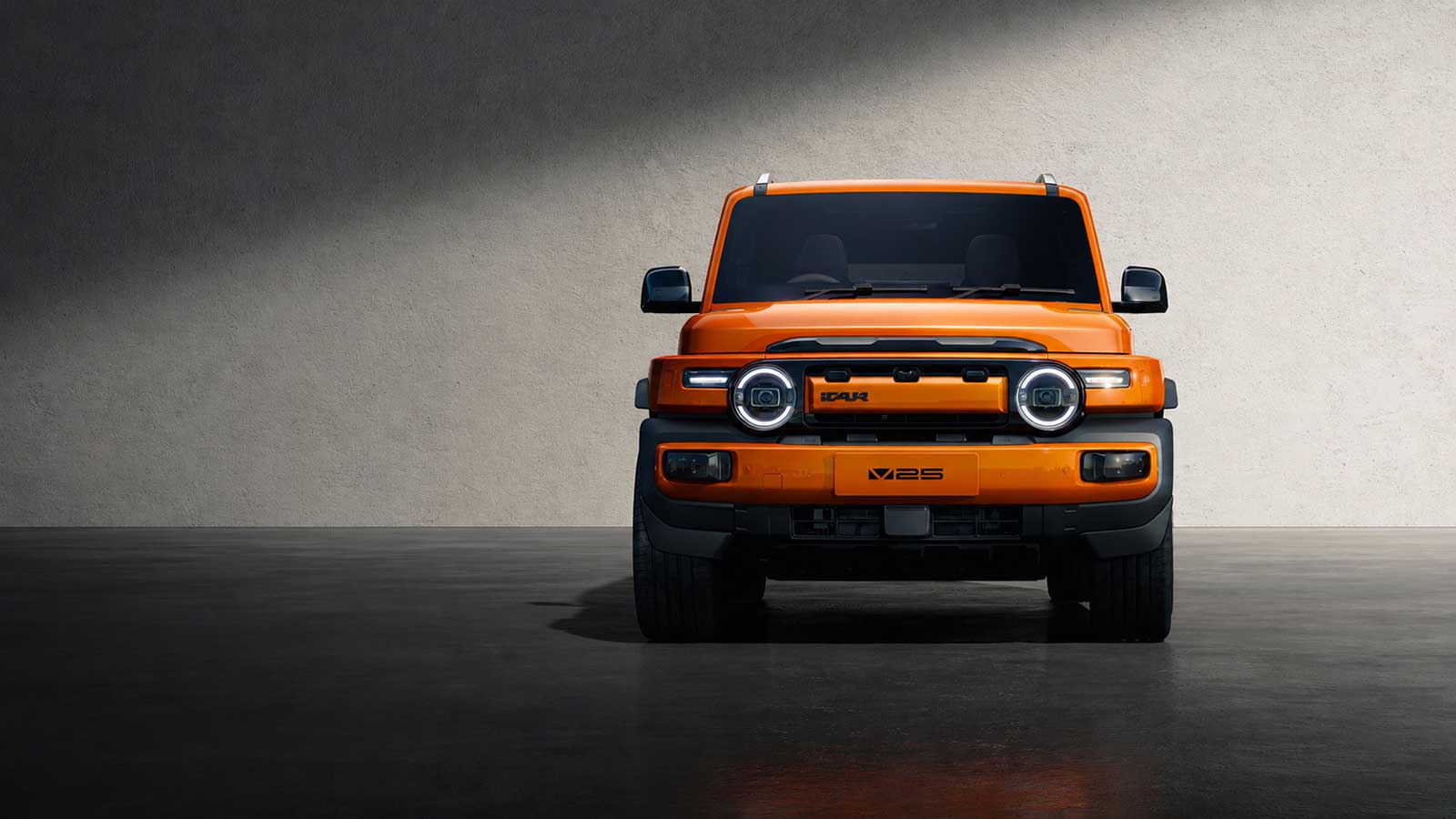 iCAUR V25 in orange, head-on in a studio